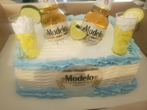 A custom decorated celebration cake made at Mario’s