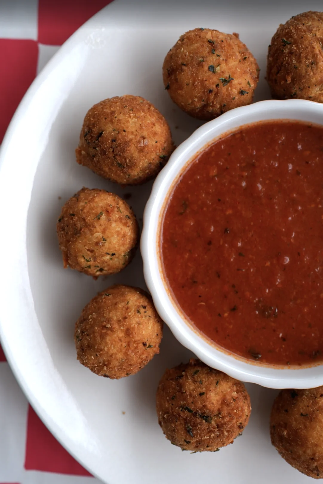 Crispy fried ravioli served with tomato sauce